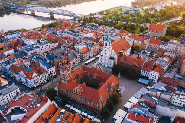 Aerial view of old town Torun in Poland with Vistula river during sunset