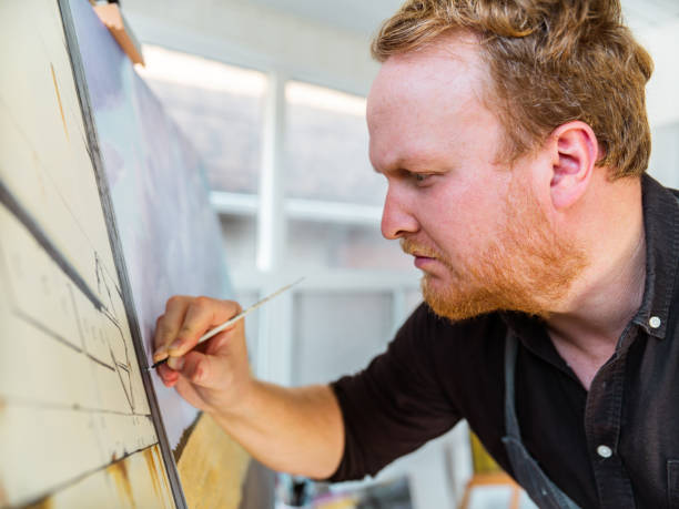 istock Man painting art in his studio 1284934049