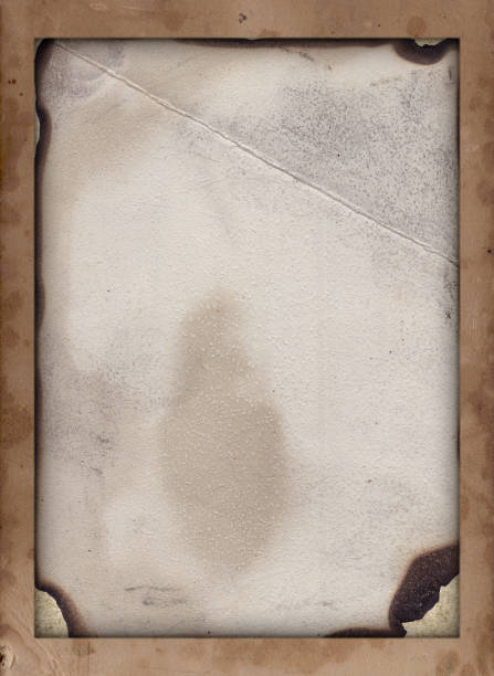 istock Vintage paper texture background with stains and scratches 1284937320