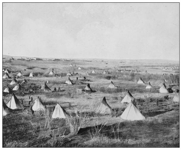 Antique black and white photo of the United States: Sitting Bull's camp before the Custer massacre Antique black and white photo of the United States: Sitting Bull's camp before the Custer massacre south dakota photos stock illustrations