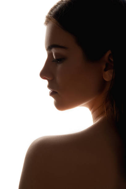 istock silhouette profile portrait beauty face woman 1284939154