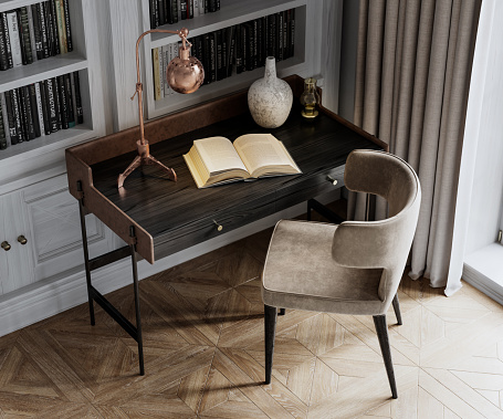 Imagen digital de cerca de una silla y escritorio con un libro abierto photo
