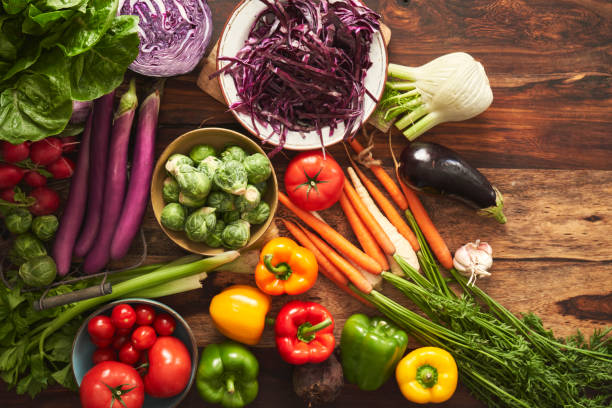 istock Variation of Healthy Fruits and Vegetables on Rustic Background 1284941079