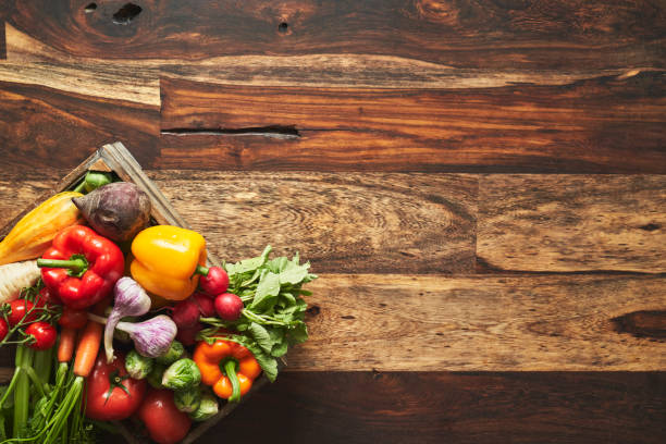 istock Variation of Healthy Fruits and Vegetables on Rustic Background 1284941691