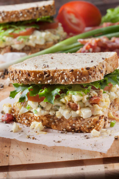 istock Egg Salad Sandwich with Crispy Bacon, Lettuce and Tomato 1284944977