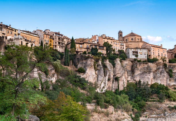 istock Hanging houses clinging to the abyss. 1284948205