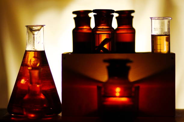 alchemy / chemistry laboratory. vintage brown bottles with a ground lid. - old laboratory alchemy alchemist imagens e fotografias de stock