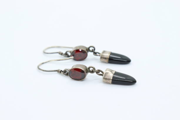 istock Silver earrings made with black and red natural stones. 1284951858