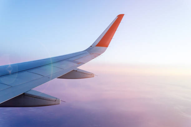 istock Clouds and sky as seen through the plane window. background, space for copy space 1284952434