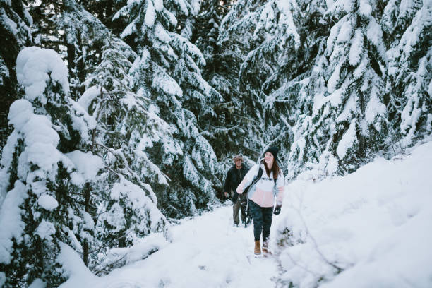 istock Hikers in Snow Covered Pacific Northwest 1284953838