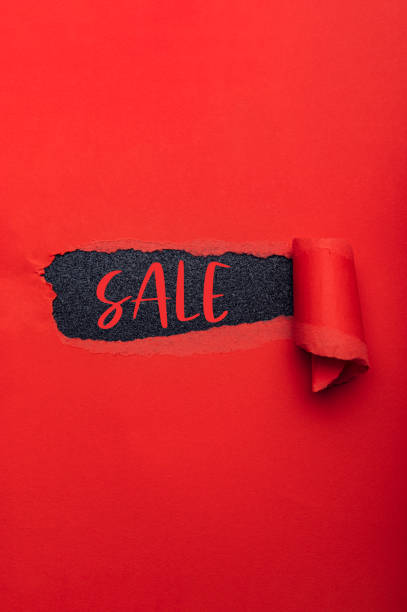 istock Sale text in paper hole 1284954825