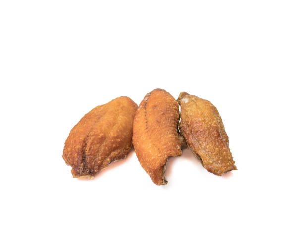 istock The deep fried fish (Nile Tilapia fish) Thai food on white background. 1284954865