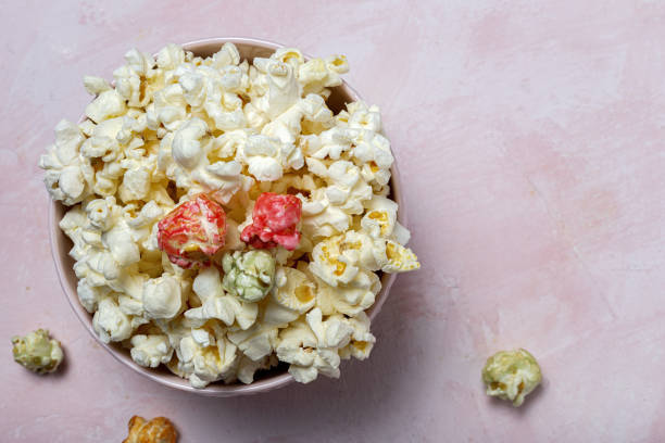 istock Homemade popcorn on on colorful backgrounds 1284955919