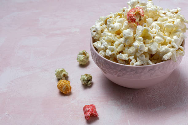 istock Homemade popcorn on on colorful backgrounds 1284955920