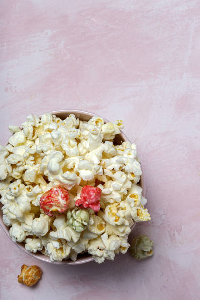 istock Homemade popcorn on on colorful backgrounds 1284955925