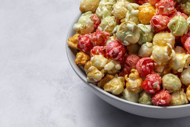 istock Homemade popcorn on on colorful backgrounds 1284955942