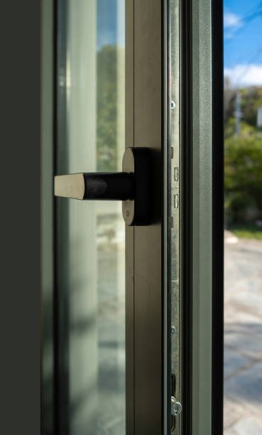 istock Aluminum door window closeup view, blurry background 1284956011