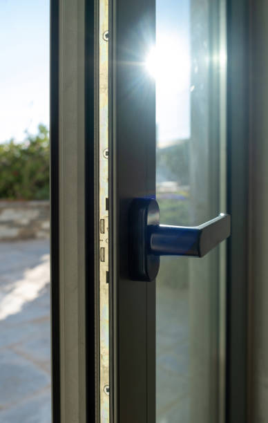 istock Aluminum door window closeup view, blurry background 1284956017
