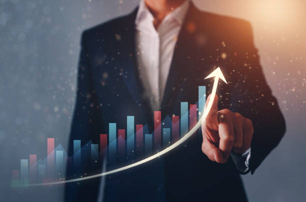 istock Businessman drawing graph growth increase company Development to success and financial growing concept. 1284957080