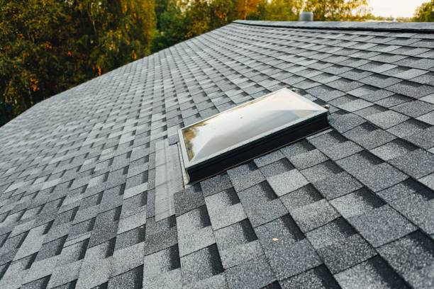 istock roof window on shingles flat polymeric roof-tiles 1284957140
