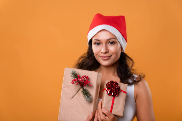 istock Woman with Christmas Gifts 1284961381