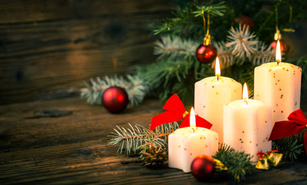 istock Christmas decoration with candles on the wooden table 1284962003