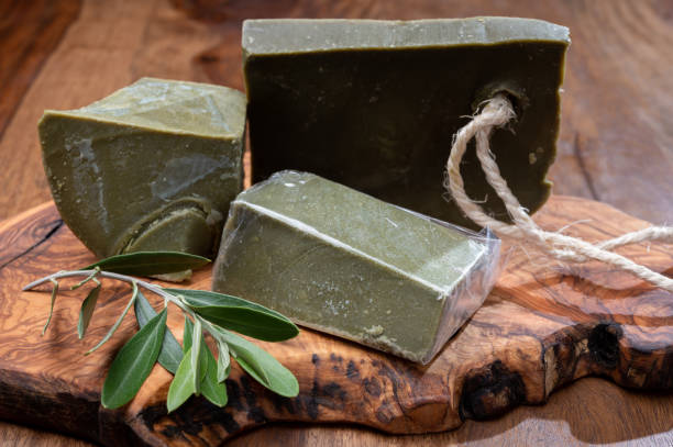 Blocks of handmade bio vegetal natural olives and bay leaf soap Green blocks of handmade bio vegetal natural olives and bay leaf soap from Provence, France savon stock pictures, royalty-free photos & images