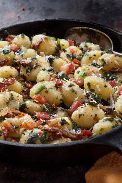 Gnocchi with Crispy Pancetta, Sun dried Tomatoes and Spinach