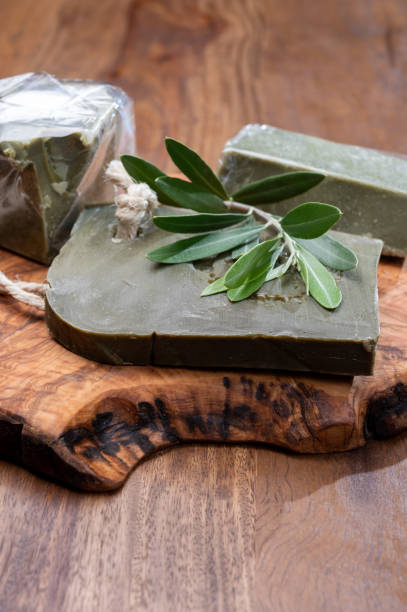 Blocks of handmade bio vegetal natural olives and bay leaf soap Green blocks of handmade bio vegetal natural olives and bay leaf soap from Provence, France savon stock pictures, royalty-free photos & images