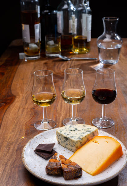istock Tasting and pairing of different cheeses with strong alcoholic drinks, whisky, cognac or calvados 1284963643