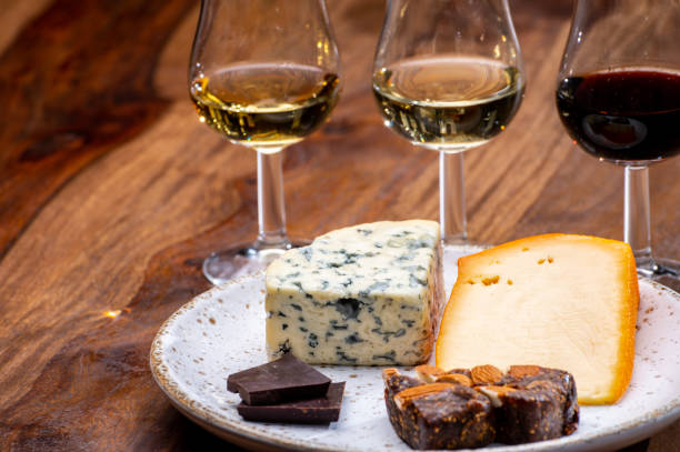 istock Tasting and pairing of different cheeses with strong alcoholic drinks, whisky, cognac or calvados 1284963648