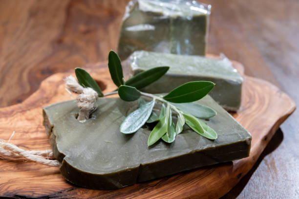 Blocks of handmade bio vegetal natural olives and bay leaf soap Green blocks of handmade bio vegetal natural olives and bay leaf soap from Provence, France savon stock pictures, royalty-free photos & images