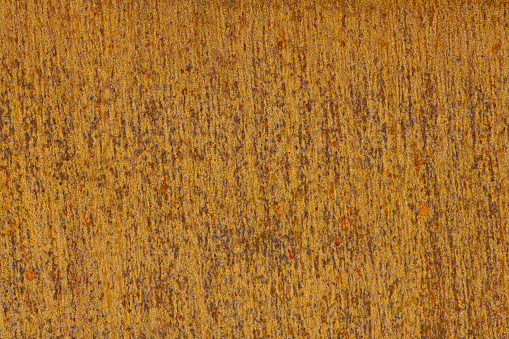 Rust Colored Steel Rusty Metal Detail Background - Textured background image with rust detail.