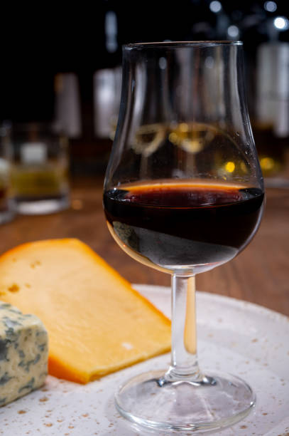 istock Tasting and pairing of different cheeses with strong alcoholic drinks, whisky, cognac or calvados 1284964457