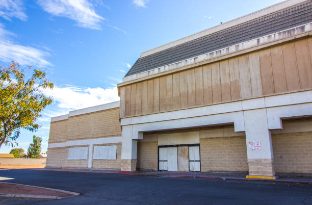 istock Closed Big Box Store With Boarded Up Entrance 1284964590