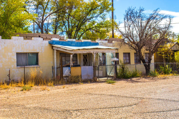 istock Old Abandoned Home In Disrepair With Front Porch 1284964822