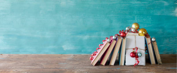 istock books as christmas gift,christmas present,reading,literature,education,making a gift concept 1284965368