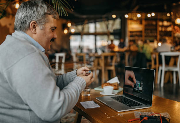 istock Mid adult man working on a side hustle 1284965956