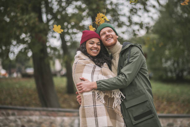 istock Beautiful young couple having an autumn date 1284966669