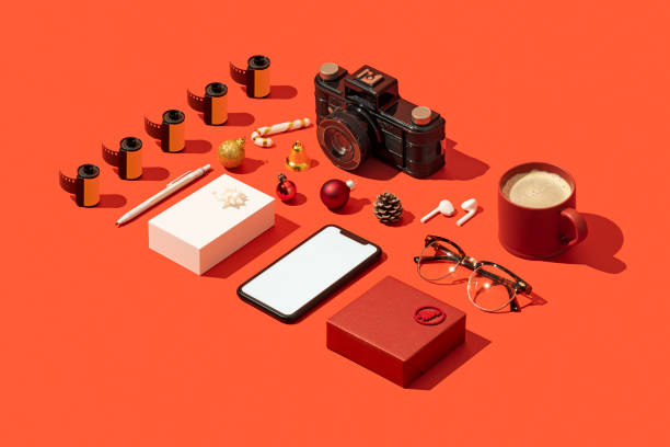 istock Smart phone mockup with christmas concept flat lay on red background 1284966970
