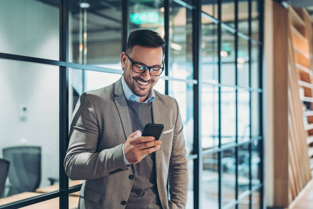 istock Businessman with a cell phone 1284970957