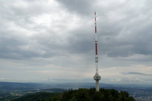 istock Telecommunication signal emitter or antenna for broadcasting on high placed Uetliberg mountain above Zurich in Switzerland. 1284972965