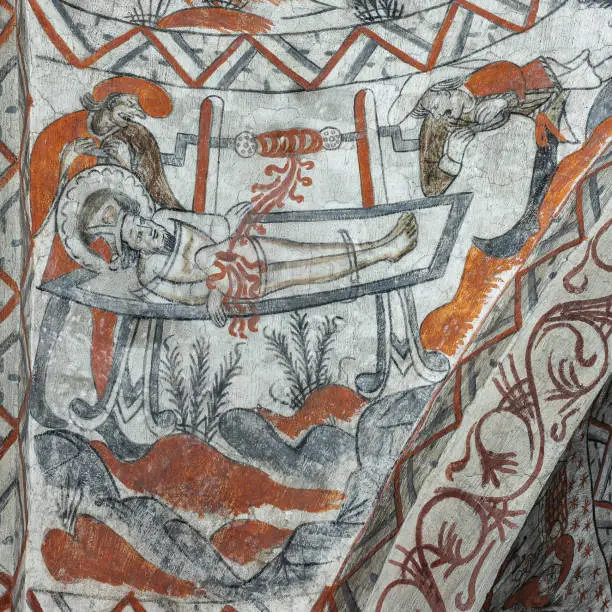 winding up the intestines of st. Lawrence, an ancient fresco in Tuse church, Denmark, July 16, 2020