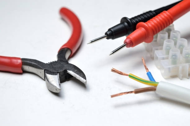 istock cutters, electric wire, tester probes and terminal block. 1284976914