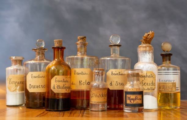 istock apothecary pots with ingredients for medicine 1284977631