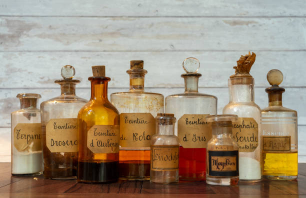 istock apothecary pots with ingredients for medicine 1284977632