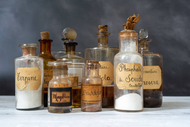 istock apothecary pots with ingredients for medicine 1284977633