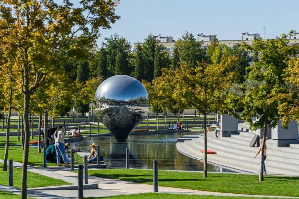 Sculpture 'Geolocation' or 'Inverted Drop' in artificial river water. Art object by Recycle group made by Andrey Blokhin and Georgy Kuznetsov in 'Galitsky Park'. Krasnodar, Russia - October 8, 2020