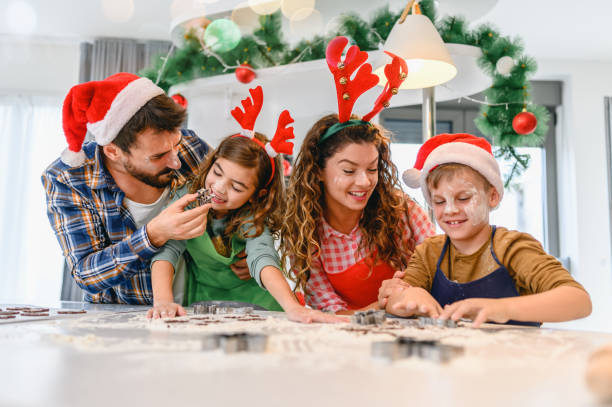 istock Family having fun while making Christmas cookies. 1284977948