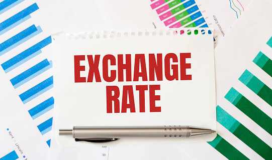 Card with text EXCHANGE RATE. Diagram and white background